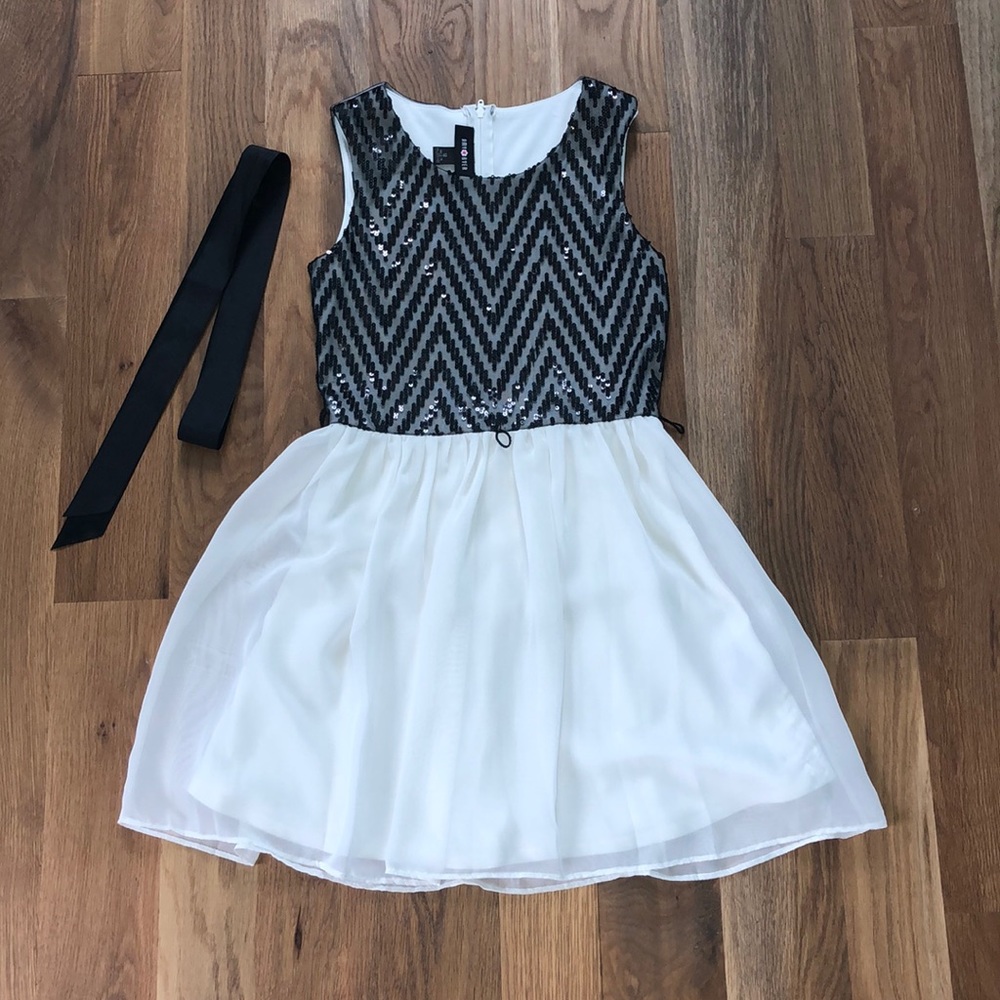 This is a kids knee length dress from Amy Byer.